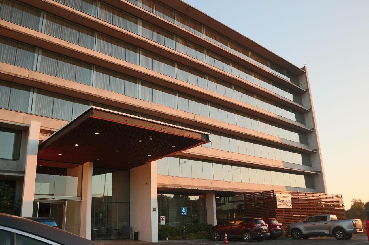 Hotel Wyndham Concepcion Pettra Exterior foto The hotel's entrance